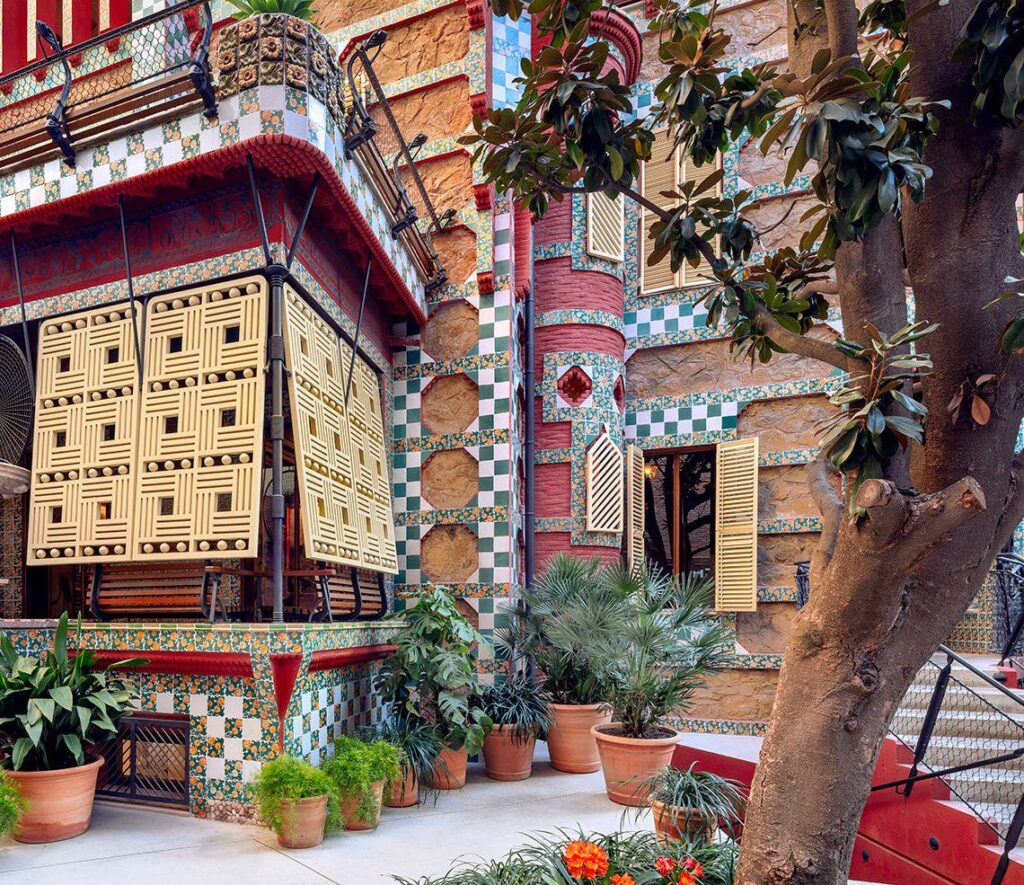 Whimsical facade of Casa Vicens in Barcelona, featuring colorful tiles and unique architectural details.